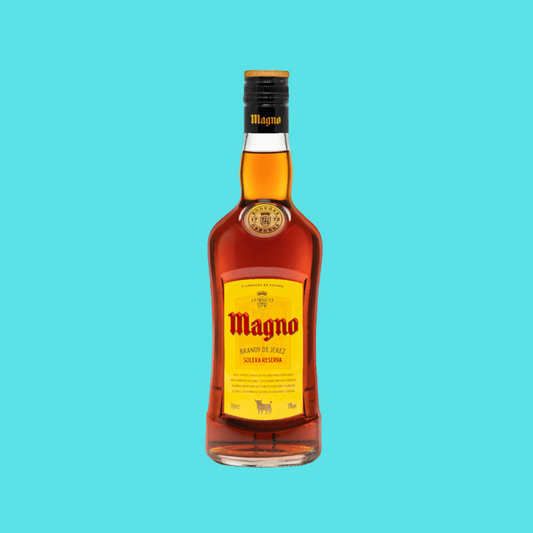 Bottle of Magno Brandy de Jerez Solera Reserva with a rich mahogany color.